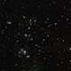 Illustration for article titled Galaxies are smashing into each other all over this cluster